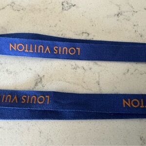 Louis Vuitton ribbon blue and orange 75” length, 0.5” wide